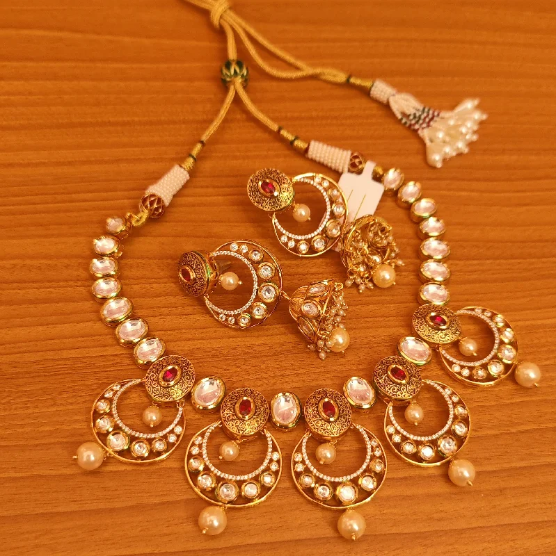 RUBY STUDDED KUNDAN POLKI WEDDING NECKLACE SET WITH JHUMKA'S