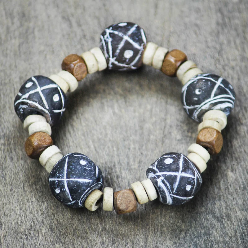 Dreams at Dusk Terracotta and Sese Wood Beaded Stretch Bracelet from Ghana